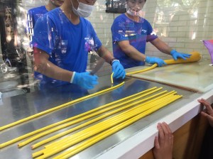 Watching them make candy